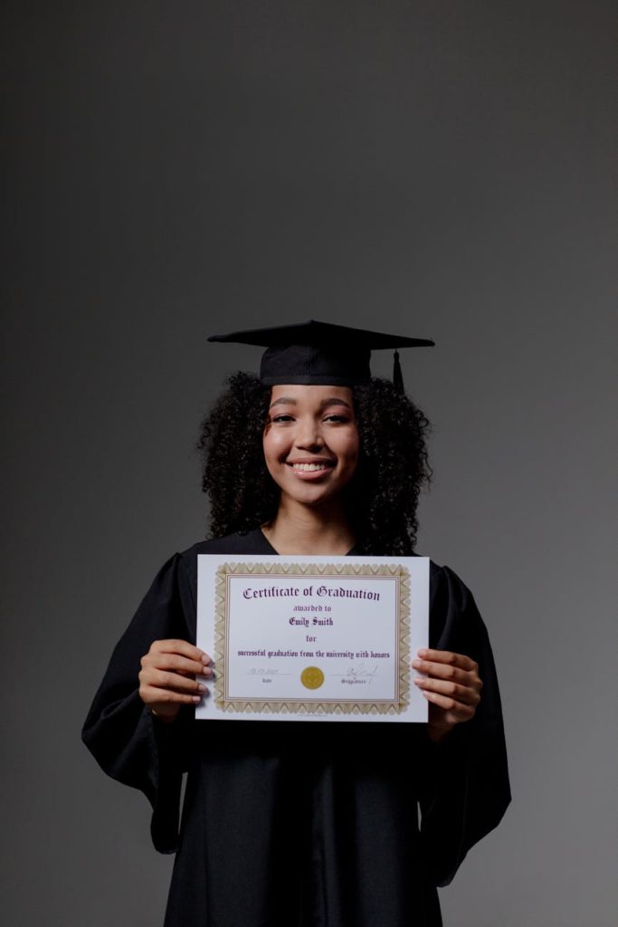woman holding a diploma